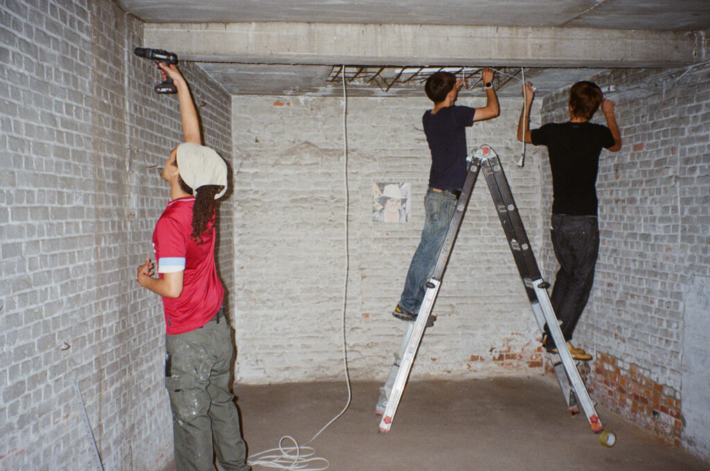 Drilling holes, hanging lights - general set up before Joseph's show in Leuven, 2024